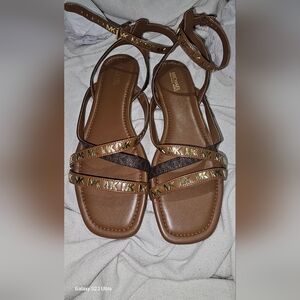 Strappy flat sandals by Michael kors